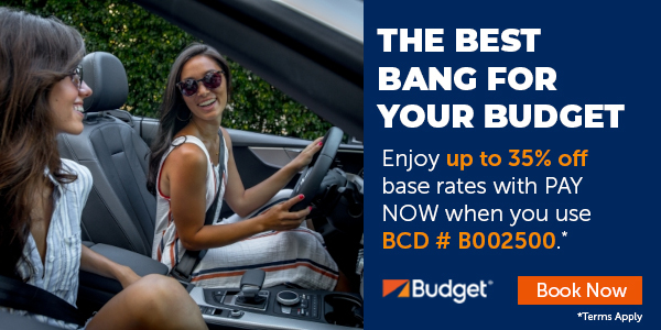 Two women in a car- Budget car rental with up to 35% off using BCD # B002500